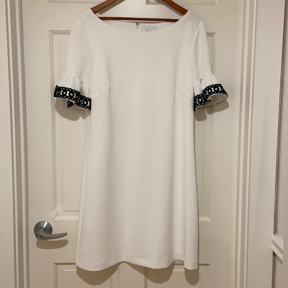 White Knee Length Dress with sleeve ruffles